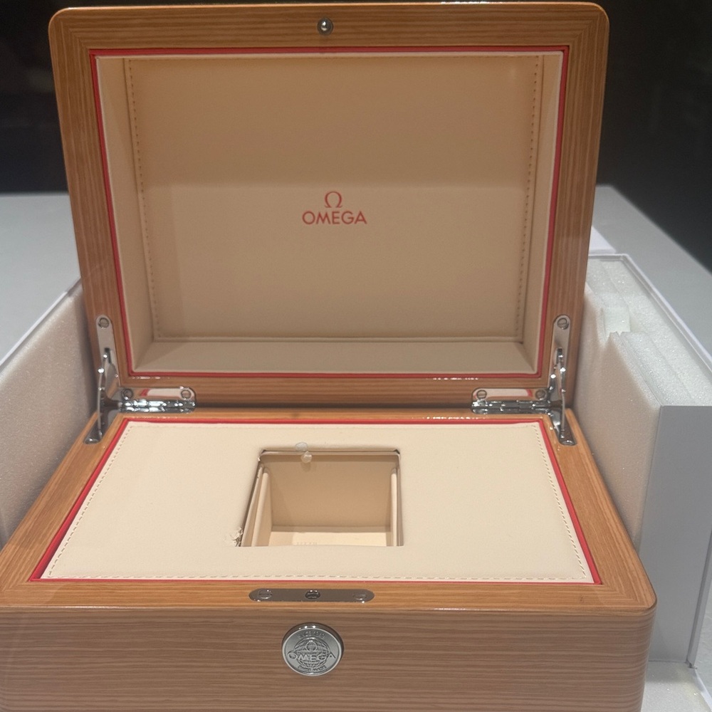Omega Luxury Wooden Watch Box with Cream and Red Accents